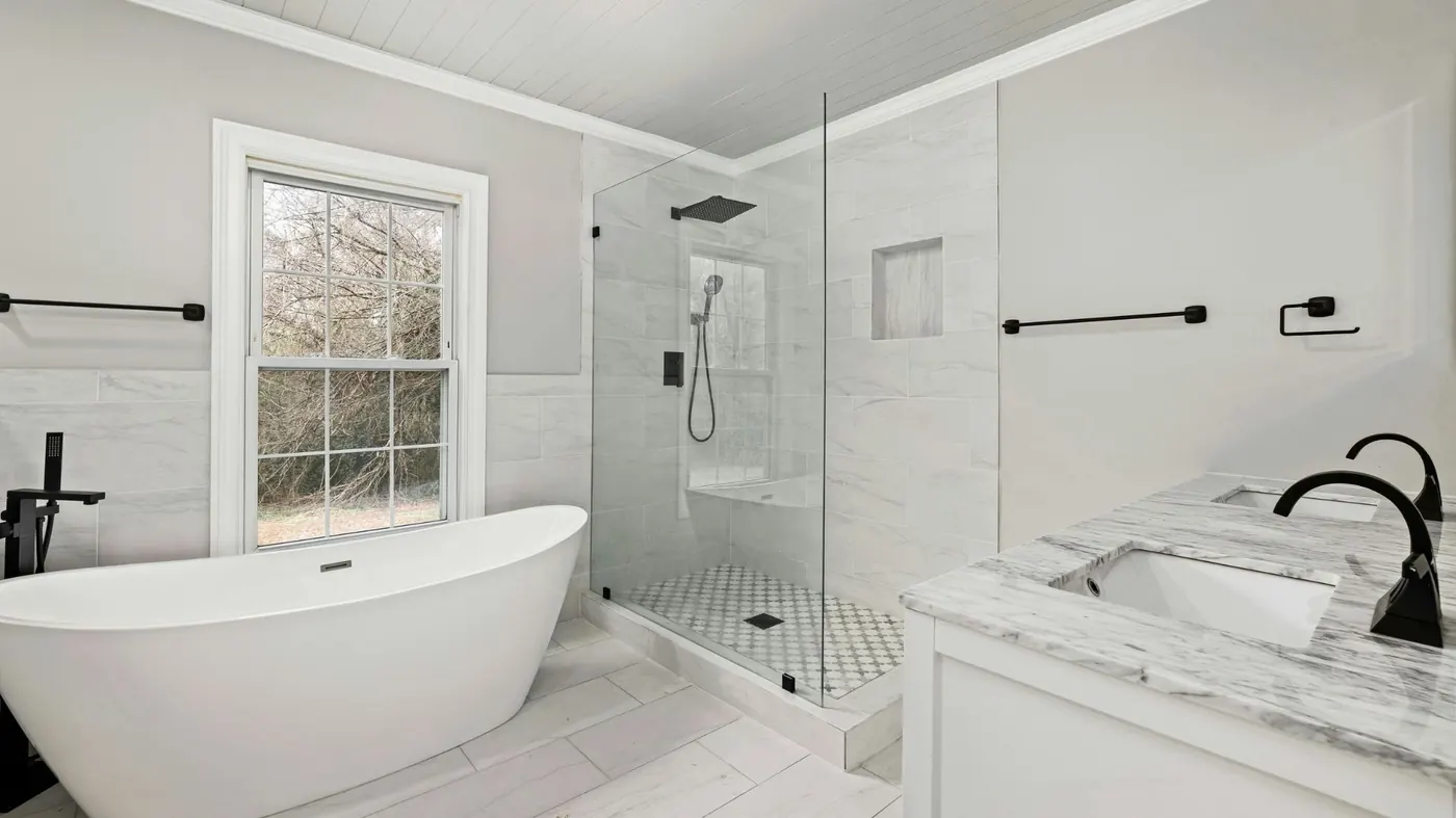Bathroom remodeling with glass shower by JPK Construction in Presque Isle ME